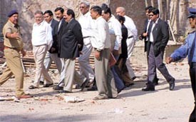 Judge J. P. Thareja, court officials, government and defence lawyers visit the spot at Kanishka Hotel
