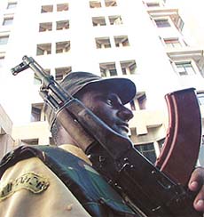 A Delhi Police commando keeps vigil at World Trade Centre
