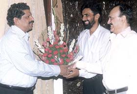 BCCI secretary S. K. Nair being received by Delhi and District Cricket Association vice-president C. K. Khanna and Chand Khanna Club joint secretary Maqsood Karim in the Capital