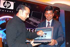 Actor Rahul Bose and HP India vice-president Ravi Swaminathan at the launch of the companies new wireless notebook 'HP nx9000'