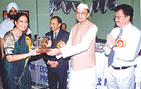 Union Minister of State for Human Resource Sanjay Paswan presenting Bharat Jyoti Award to Dr Kamla Bhardwaj at a function in the Capital.