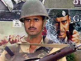 A soldier stands guard during Prime Minister Atal Bihari Vajpayee's Jammu visit 