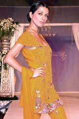 A Pakistani model showcases bridal collections of an Indian designer 