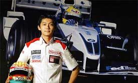 Asia's No 1 Formula BMW star Tung Ho Pin poses beside a BMW Williams F1 car
