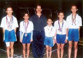 Gymnasts of Government Model Senior Secondary School, Sector 10, who won the overall team championship along with their coach Rajinder Sharma