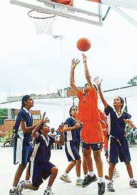 Girl cagers vie for supremacy in the final of the Pandit Mohan Lal Memorial Basketball Tournament at SD Public School, Sector 32, Chandigarh