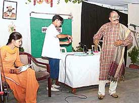 A scene from Punjabi musical play "Daairey" being enacted at Dev Samaj College for Women, Sector 45