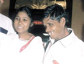 Neha Sharma with father after her successful operation