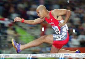 Felix Sanchez of the Dominican Republic clears a hurdle on his way to win the Men's 400m hurdles final 