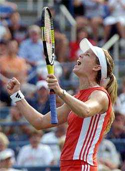 Meghann Shaughnessy of the US reacts after defeating Vera Zvonareva of Russia
