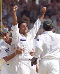 Pakistani fast bowler Shoaib Akhtar celebrates the dismissal of Bangladesh batsman Razin Saleh 