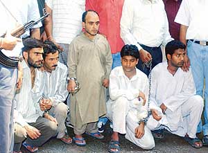 Arrested Jaish-e-Mohammad militants being produced at the Lodhi Colony special cell in New Delhi on Sunday.