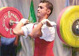 Cpl Duttan of the Maintenance Command lift to glory in the Air Force weightlifting Championship which began at the 3BRD