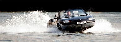 The Gibbs Aquada, the world's first High Speed Amphibian vehicle, is demonstrated at its unveiling on Thames river in London 