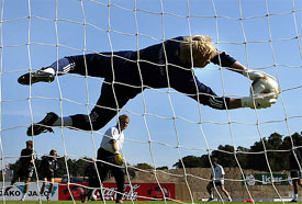 German goalkeeper Oliver Kahn makes a save during the team's training session in Frankfurt