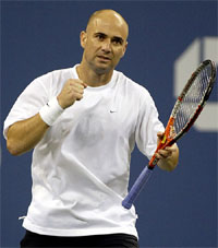 Andre Agassi of the USA celebrates after winning the second set from fellow countryman Taylor Dent during their match