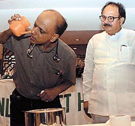 Dr K.K. Aggarwal, Executive Vice-Chairman, HCFI, demonstrating Jalneti while Dr A.K. Walia, Delhi Health Minister looks on during a press conference in the Capital on Thursday. 