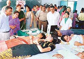 Students donate blood at a camp in Dev Samaj College, Sector 45