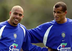 Brazilian and Spanish team Real Madrid soccer star Ronaldo Nazario and his teammate Rivaldo Ferreira