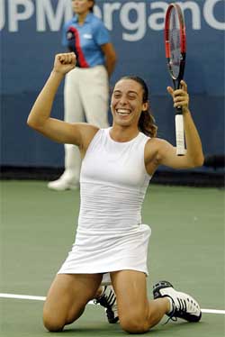 Francesca Schiavone of Italy celebrates her win over Ai Sugiyama of Japan