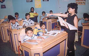 A student of Children's Valley essays the role of a teacher on the occasion of Teacher’s Day