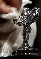 An employee of Rolls Royce cleans Emilie