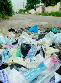 Biomedical waste lies scattered on the road in the Gurdev Nagar locality