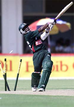Bangladesh batsman Rajin Saleh is bowled by Pakistan medium pacer Abdul Razzaq