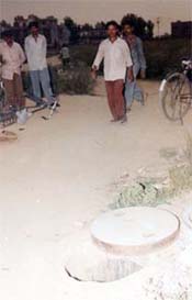 An open manhole that is posing a threat to pedestrians in Urban Estate, Dugri