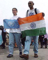 Debashish Deo and his Ramanian wife Garsco Antena, who are on a world tour, walk on the ridge in Shimla 