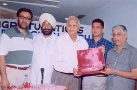 Mr Harbhagwan Singh, Advocate-General, Punjab, being honoured at a function