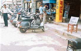 A No Parking sign outside a Bhadaur House shop has discouraged two-wheeler drivers from parking their vehicles