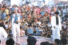 Students stage a play on the scourge of AIDS