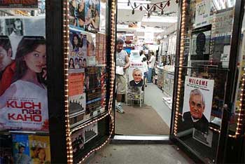 Posters of Indian Prime Minister Atal Bihari Vajpayee are seen at a department store