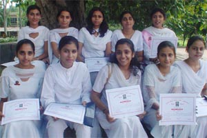 Some of the students of Government College for Women who were honoured on Hindi Divas at their college
