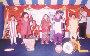 Tiny-tots showing their love and respect to the grandparents by presenting a cultural show.