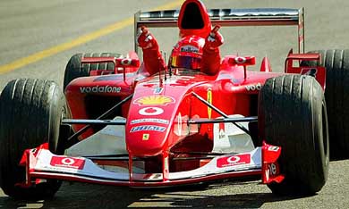 Ferrari's world champion German driver Michael Schumacher celebrates his victory at the Italian Formula One Grand Prix
