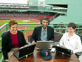 Anoop Gupta (C), corporate vice president of Microsoft, sits on top of the "Green Monster" 