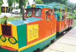 City residents having a nice time in the toy train at Indira Holiday Home