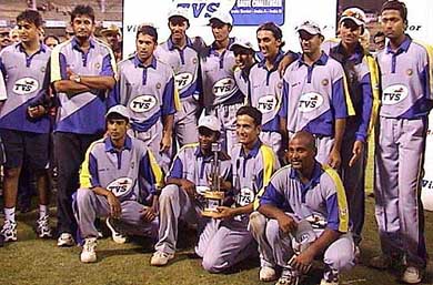 The victorious India A cricket team poses for a photograph with the Challenger Trophy after they defeated India B team