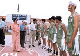 Senior national cricket selector Kirti Azad meeting players before the start of the Ramjas Inter-School Basketball Tournament