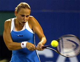 Jelena Dokic of Yugoslavia returns against compatriot Jelena Jankovic