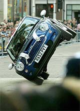 A Mini Cooper arrives at the UK premiere of "The Italian Job" at the Empire Leicester Square in London 