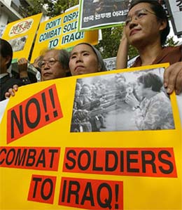 South Korean protesters demonstrate at a rally against a possible dispatch of combat troops to Iraq 