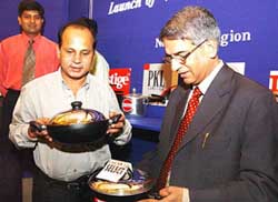 Director of Bharat Petroleum S. Radhakrishnan and LPG Executive Director R. K. Singh at the launch of 'Beyond LPG