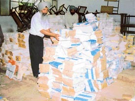 Piles of books stocked at Government Girls Senior Secondary School, Bharat Nagar,