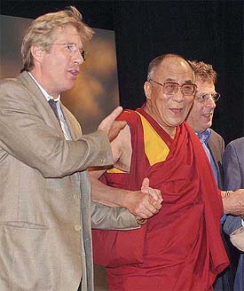 The Dalai Lama is joined by actor Richard Gere and composer Philip Glass at a news conference in New York 