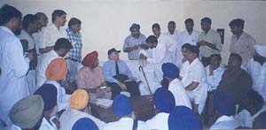 Lieut-Gen A. M. Sethna, member of the National Minority Commission, records statements of the local people regarding the incident of alleged torture of four Sikh youths