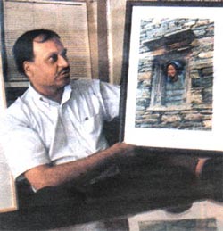 Somesh Goyal with one of his many photographs