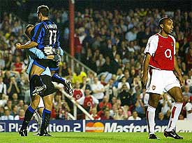 Inter Milan goal-keeper Francesco Toldo celebrates with Fabio Cannavaro after saving Arsenal Theirry Henry's penalty 